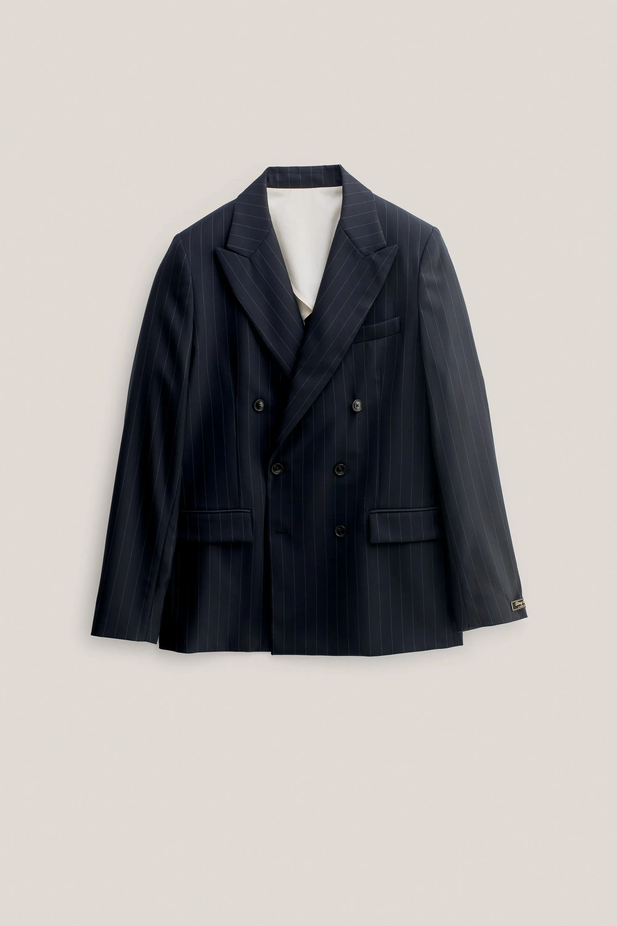 DOUBLE-BREASTED PEAK BLAZER