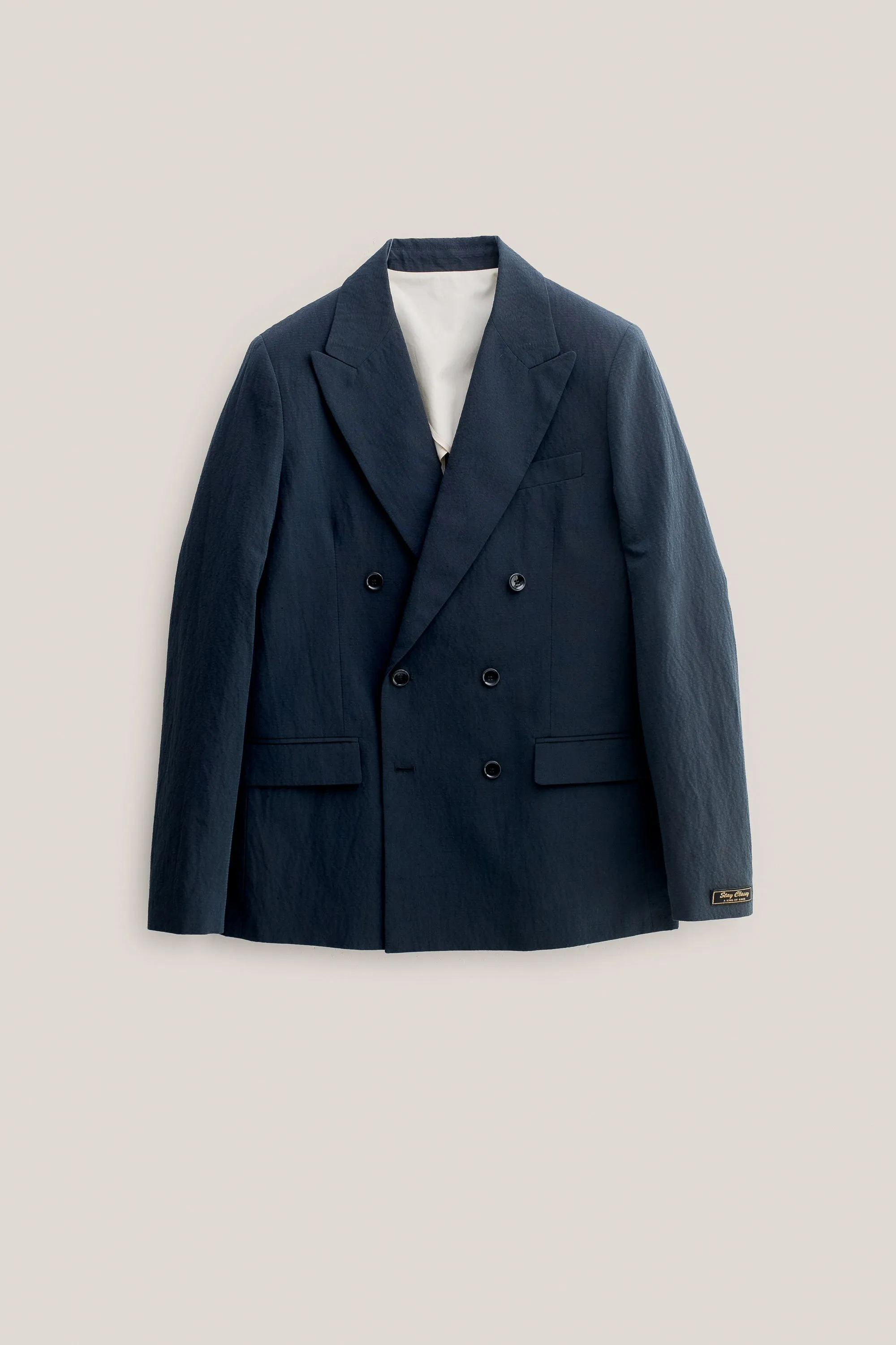 DOUBLE-BREASTED PEAK BLAZER